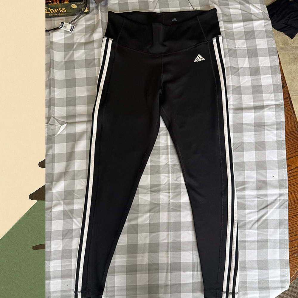 Adidas Black and White Track Pants with Iconic Stripes